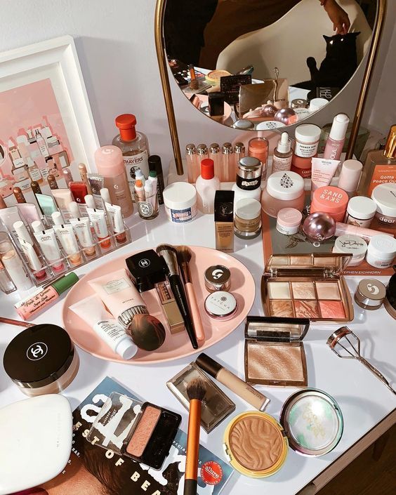 Pink beauty products on bathroom table, makeup, skincare and 