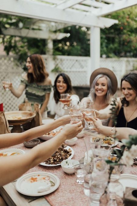 Ladies eating food and celebrating