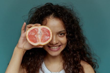 Woman with grapefruit