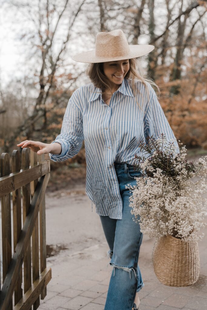 Joey wearing Vince shirt and FRAME denim jeans