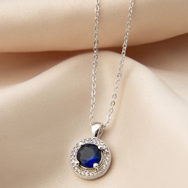 Elika Silver/ Sapphire Blue Round Pendant Necklace